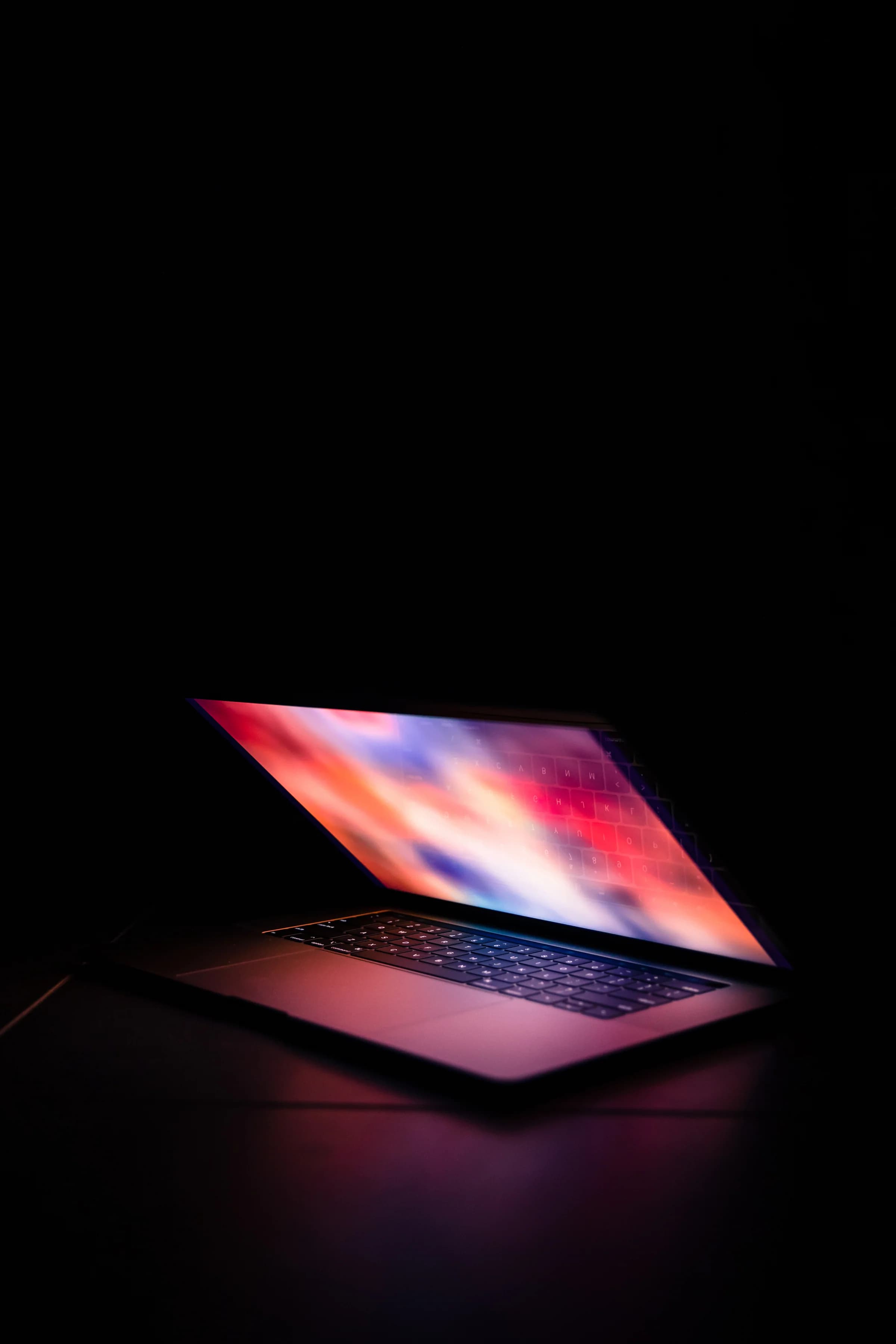 Macbook laptop with glowy screen 